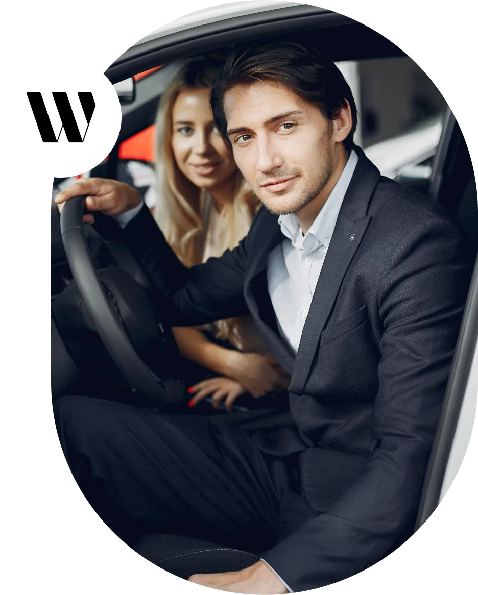 Professional chauffeur providing corporate travel service